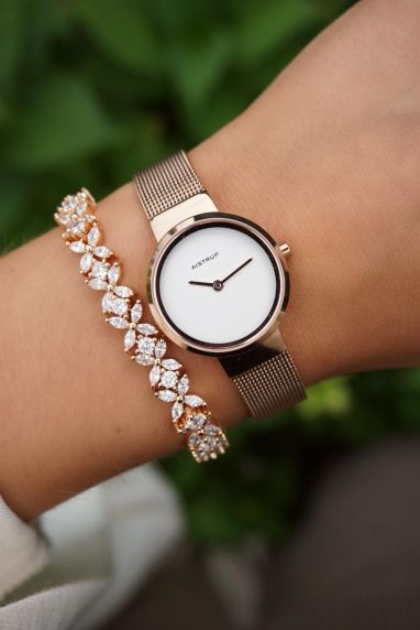 Elegant women's watch with white dial, rose finish, and quality mesh strap in a sleek design | AIW7615