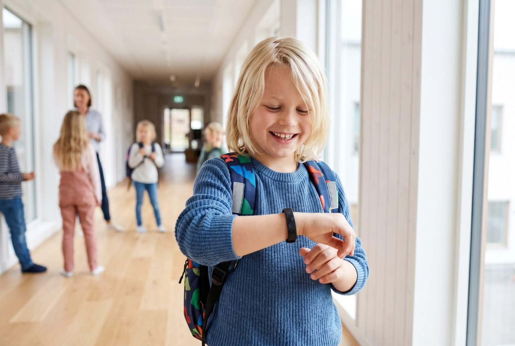 Child at school wearing a Fibex Reminder watch